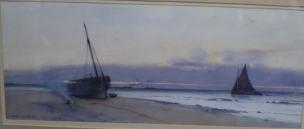 Carleton Grant RBA (1860-1930), watercolour, Fishing boats along the coast at daybreak, signed and dated 1892, 25 x 60cm